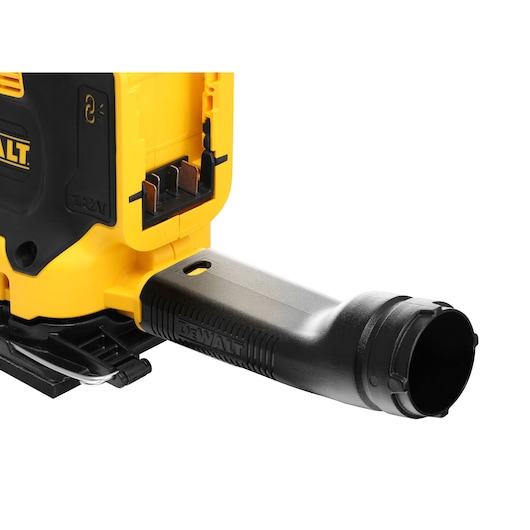 Close-up of a DEWALT power tool showing a black attachment for dust extraction.