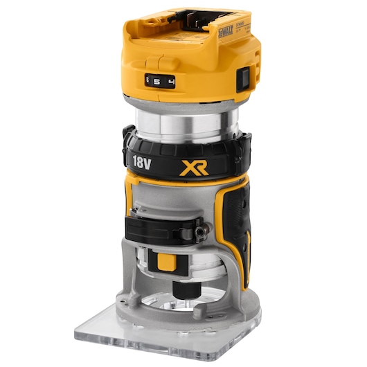 A DEWALT DCW600N cordless compact router featuring an 18V XR motor. The tool is mainly yellow with black and silver accents, and has a transparent flat base for stability during woodworking tasks.