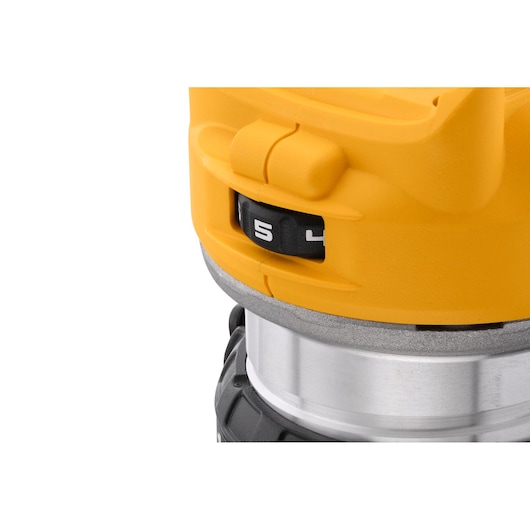 Close-up view of the adjustable dial and control on a DEWALT power tool with a yellow casing, showing numbers 4 and 5.