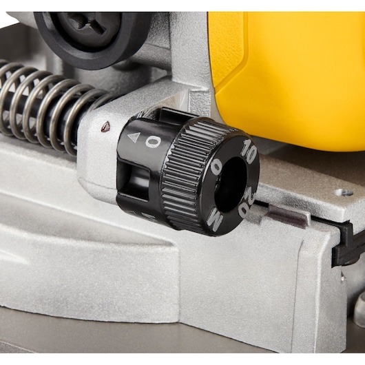 Close-up of DEWALT tool adjustment knob, models DCW682P2-QW and DCW682P2, yellow and silver, photography category.