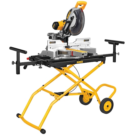 DEWALT DE7260 miter saw stand with yellow frame and wheels for portable tool support.