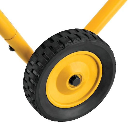 Close-up of a DEWALT yellow wheel with black tire, attached to a yellow metal frame, isolated on white background.