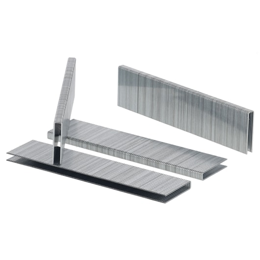 Several strips of metal staples are arranged on a white background.