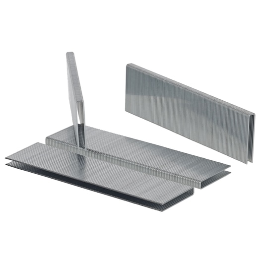 Several strips of DEWALT metal staples arranged together on a white background.