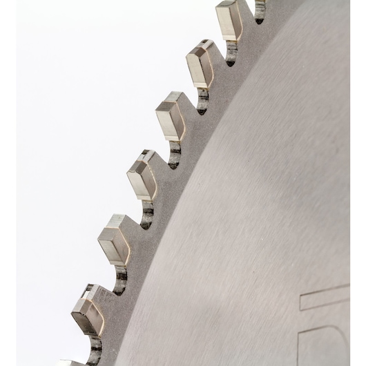 Close-up view of metal saw blade teeth with sharp edges against a white background.