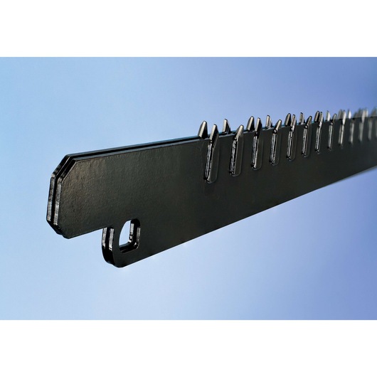 Close-up of a DEWALT DT2972 saw blade with sharp teeth against a blue background.