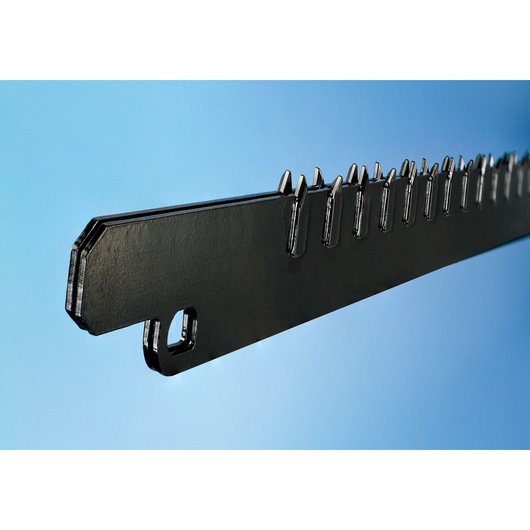 Close-up of a DEWALT DT2973 chainsaw blade with sharp teeth against a blue background.