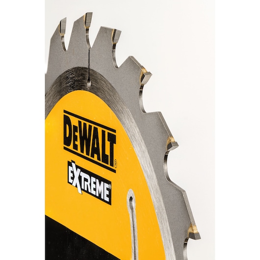 Close-up of a DEWALT Extreme circular saw blade showing teeth and yellow branding.