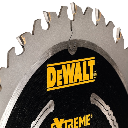 Close-up of a DEWALT DT4395 circular saw blade with sharp metal teeth and brand logo.