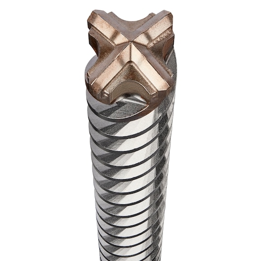 Close-up of a DEWALT hammer drill bit with spiral grooves and a cross-shaped tip.