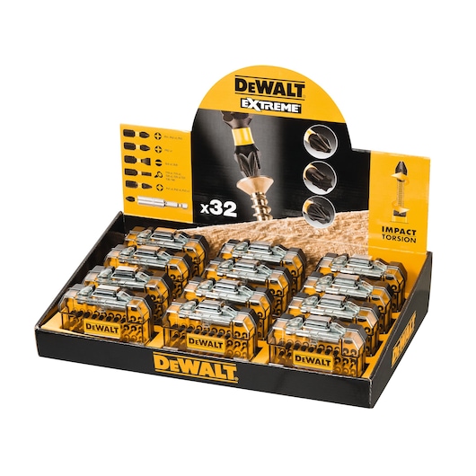 DEWALT Extreme display with multiple sets of impact torsion screwdriver bits in yellow and black cases.