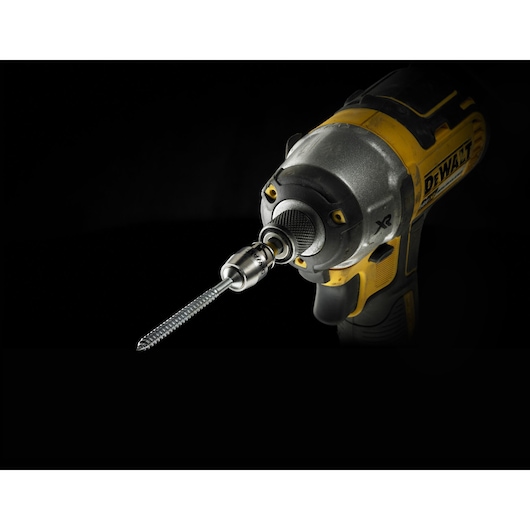 DEWALT cordless drill with bit attached, shown on a black background.