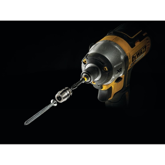 DEWALT drill showing a magnetic bit holder and screw against a black background.