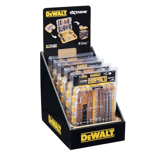 Display box with DEWALT Extreme drill bit sets in tough plastic cases. Yellow and black branding on packaging.