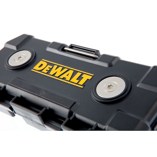 Close-up of a DEWALT black tool case with metal latches and the yellow DEWALT logo on the lid.