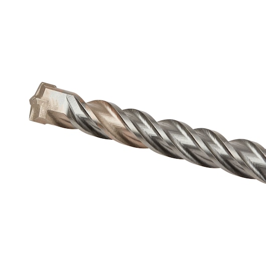Close-up of a DEWALT DT9683 masonry drill bit with a metal spiral design and carbide tip, used for drilling into concrete and stone.
