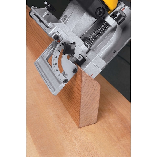 DEWALT DW682K-QS, DW682K tool close up on wood. Photography product for carpentry.