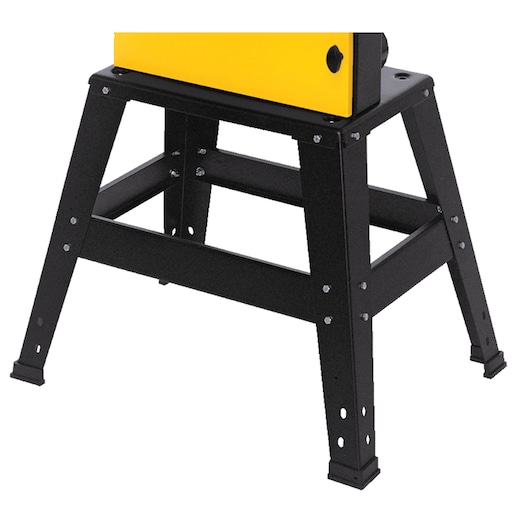 Black metal stand with sturdy legs supporting a yellow device, shown partially from the side.