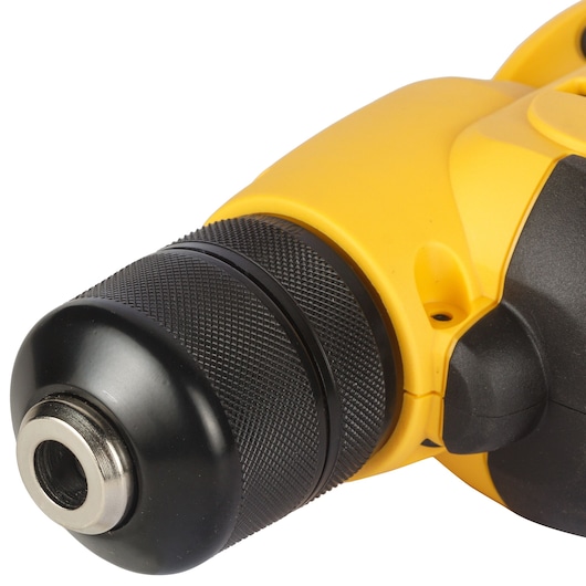 Close-up of a yellow and black Dewalt drill chuck.