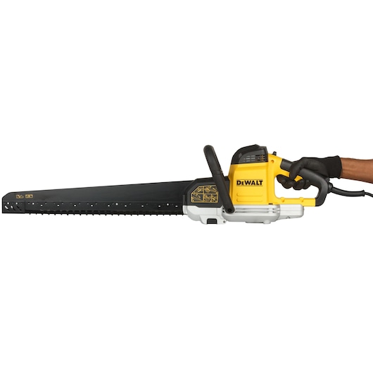 DEWALT electric wall saw with long blade, yellow and black, held by a gloved hand on a white background.