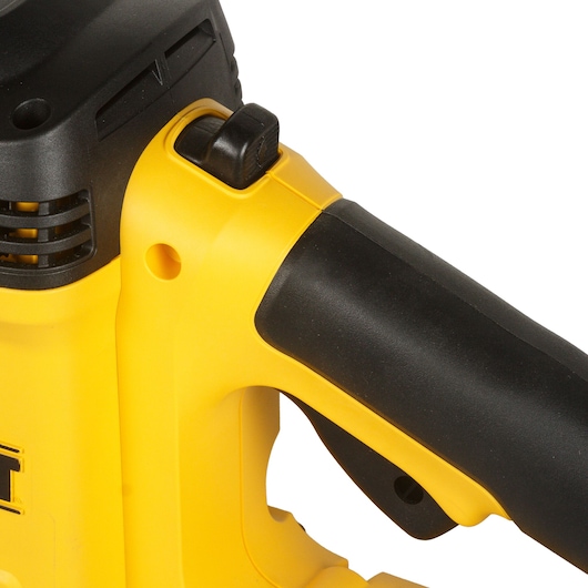 Close-up of DEWALT DWE397-QS tool handle and power switch in yellow and black.