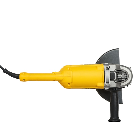 Yellow DEWALT DWE492 angle grinder with side handle and power cord, viewed from the side on a white background.