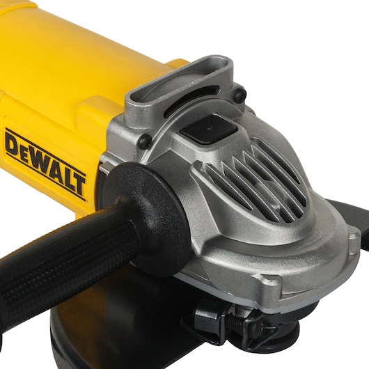 Close-up of a DEWALT DWE492 angle grinder showing handle and metal housing.