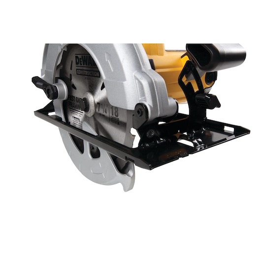 Close-up of a DEWALT DWE560 circular saw blade and base, highlighting construction details.