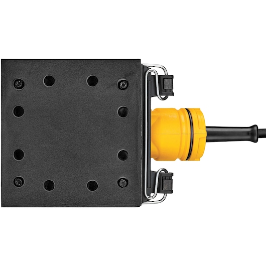 Close-up view of the bottom of a DEWALT DWE6411 electric sander, showing its flat black sanding pad with multiple holes and the yellow body with an attached power cord.