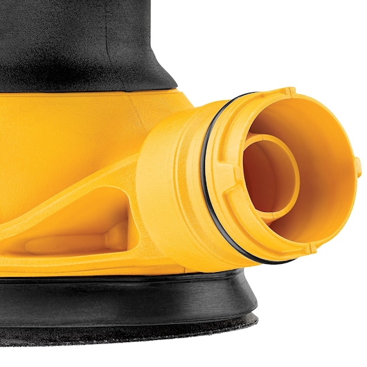 Close-up image of a DEWALT DWE6423 power tool showing the yellow and black dust extraction port and part of the base.