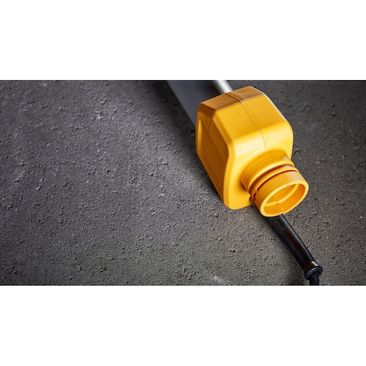 DEWALT DWE7800, DWE7800-QS: yellow tool part on textured surface, photography category.