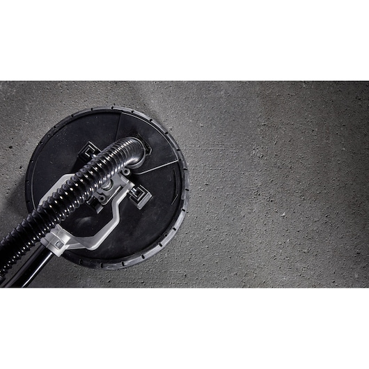 DEWALT DWE7800, DWE7800-QS photography tool base on concrete surface, close-up view.