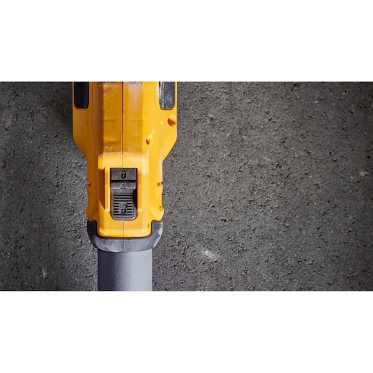 DEWALT DWE7800, DWE7800-QS tool close-up, yellow casing and control switch, photography category.