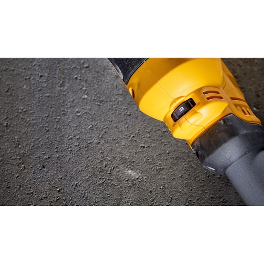 DEWALT DWE7800, DWE7800-QS tool detail close-up, yellow housing and switch, photography category.