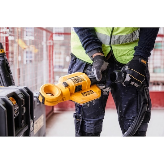 DEWALT dust extraction tool for photography, SKUs DWH050, DWH050K, DWH050-XJ, shown in use on-site.