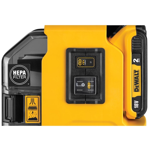 Close-up of DEWALT DWH161D1 showing HEPA filter label, control buttons, and battery detail.