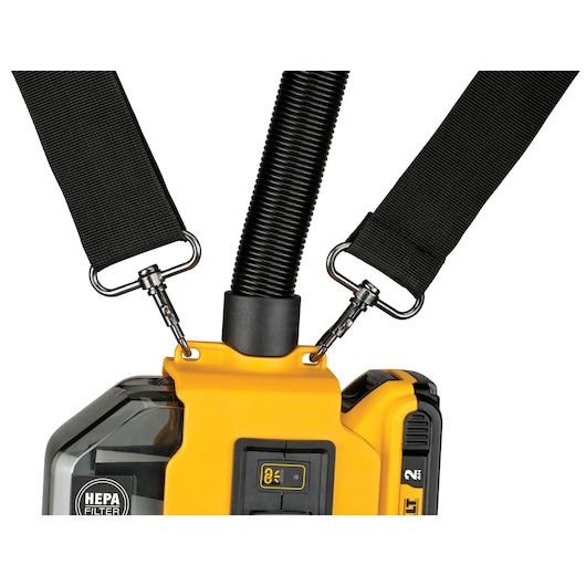Close-up of DEWALT HEPA filter tool with attached hose and black carrying straps.