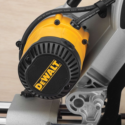 DEWALT motor detail for DWS780, DWS780KIT. Yellow and black housing, photography product category.