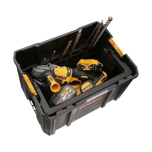 DEWALT toolbox containing power tools and drill bits, shown open and organized for storage.