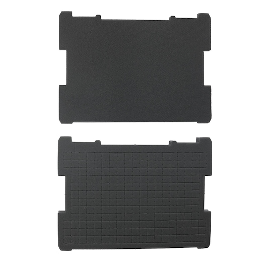 Two rectangular black foam inserts, one plain and one grid-patterned, used for tool storage or protection.