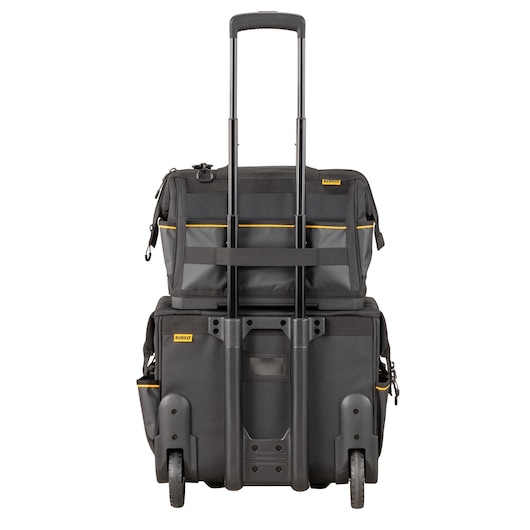 DEWALT rolling tool bag with telescopic handle and wheels, suitable for carrying tools and equipment.
