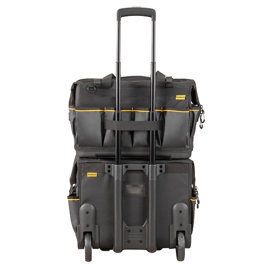 DEWALT rolling tool bag with telescopic handle, black design, multiple pockets and compartments, seen from front.