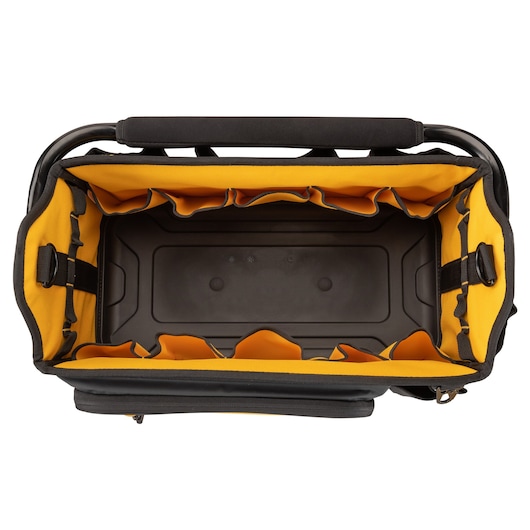 Top view of an empty DEWALT tool bag with yellow lining and multiple interior pockets.
