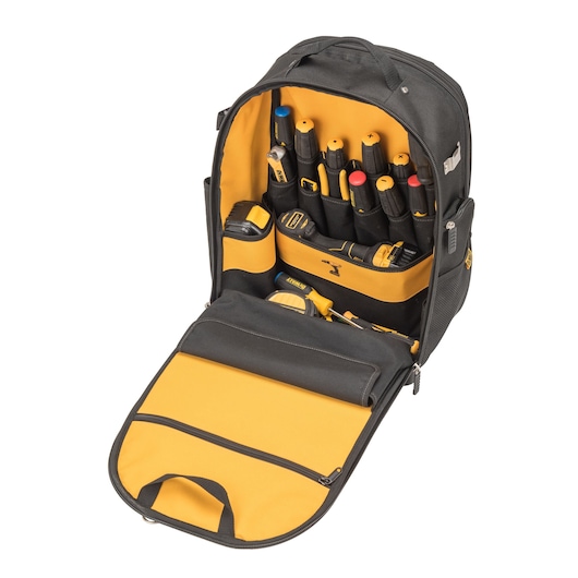 Open DEWALT tool backpack with organized tools inside, yellow and black interior, multiple compartments visible.