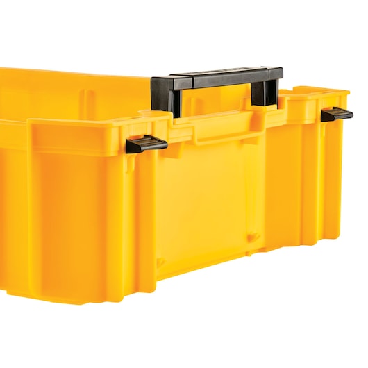 Yellow DEWALT toolbox with black handle and clips, partially shown, on a white background.