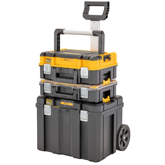 A stack of three DEWALT TSTAK toolboxes with an extended handle and wheels, designed for easy transportation and secure tool storage.