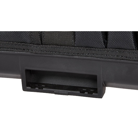 Close-up of a black DEWALT carrying case corner with textured fabric and a plastic handle slot.