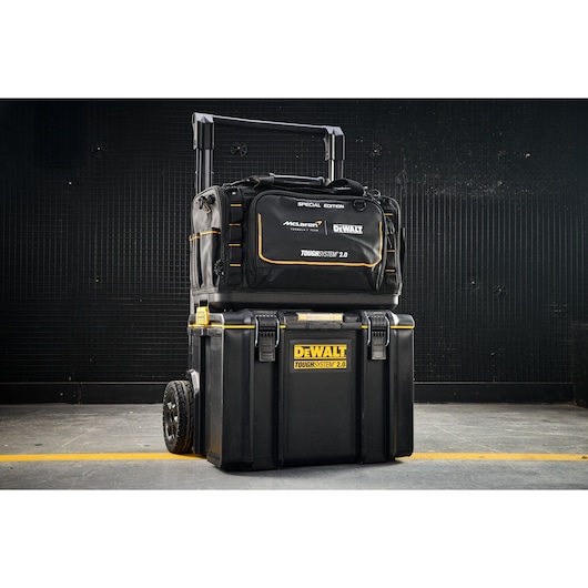 DEWALT ToughSystem 2.0 toolboxes with a special edition bag stacked, shown in an industrial setting.