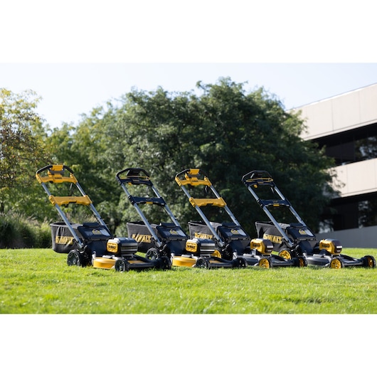 DEWALT lawn mowers outdoors, SKUs: DCMWSP550N, DCMWP500N, DCMWP134N, DCMWP134W2, DCMWSP156N, DCMWSP156W2.